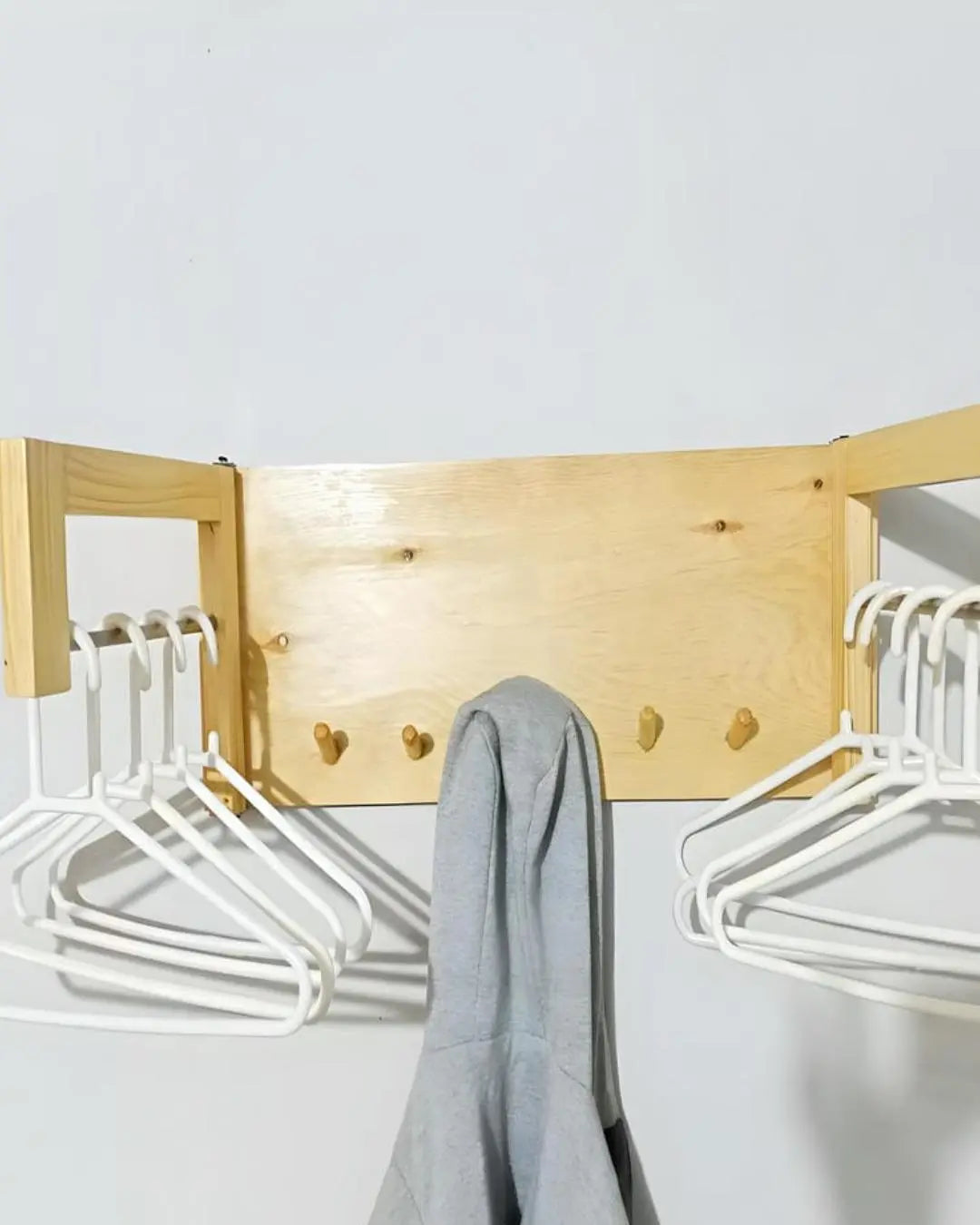 Wooden Hanger Stand Folding with 6 Clothes Hanging Hooks Xeili owner